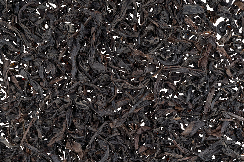 干红茶的叶子靠近作为背景图片下载