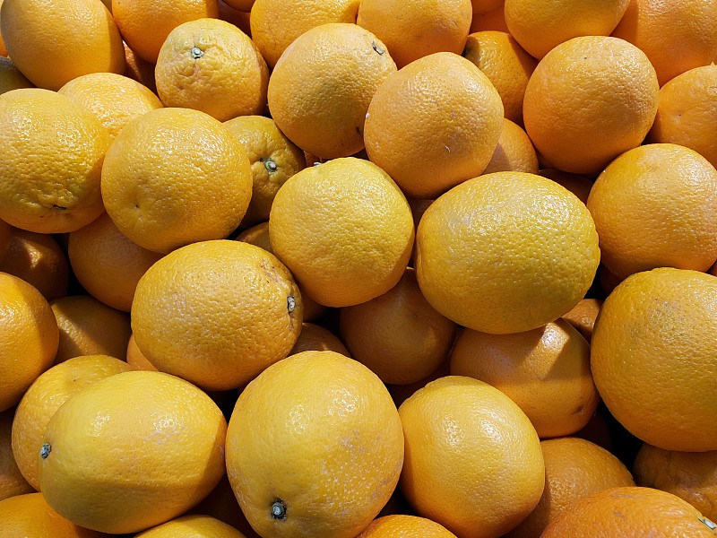 成堆的黄色橙子图片下载