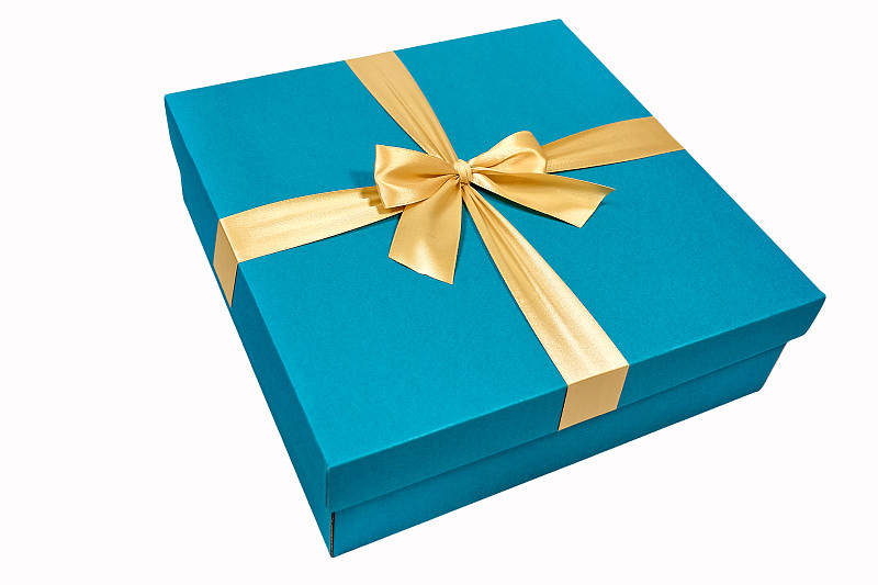 优雅的蓝色硬纸板礼盒与一个金色的蝴蝶结图片下载