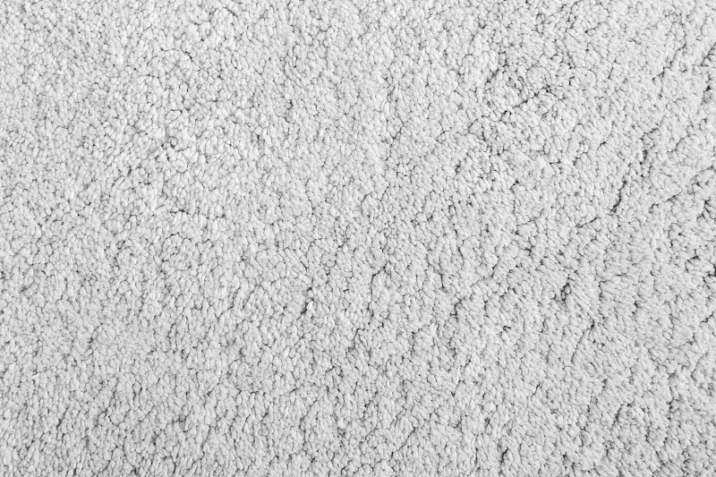 毛茸茸的地毯纹理背景的特写从上面看在黑色和白色。图片下载