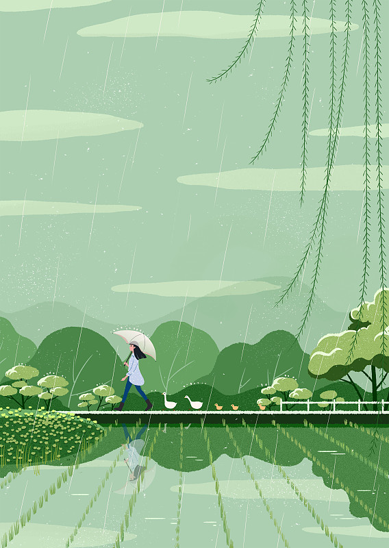春雨里一个女孩打伞走在绿色的田边图片素材
