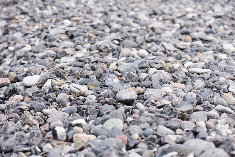 海滩卵石的全帧照片，Stege，丹麦摄影图片