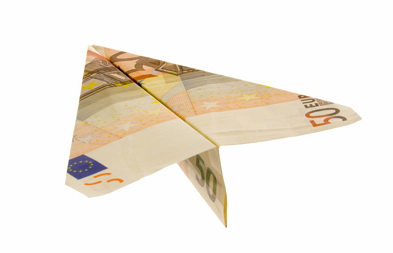欧洲纸币纸币上的白色背景的纸飞机图片下载