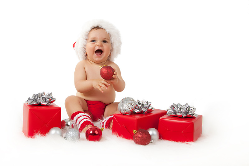 带着圣诞装饰的微笑男婴图片下载