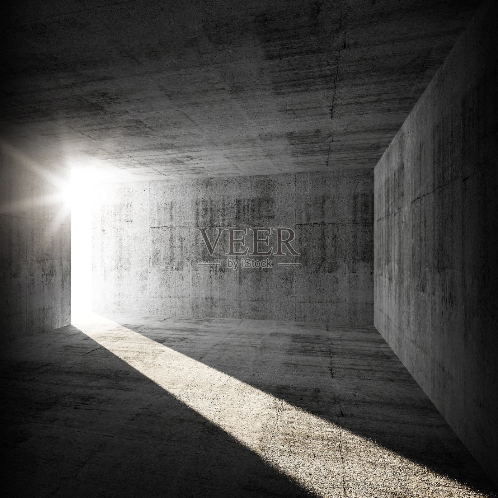 抽象的空旷黑暗的混凝土内部与阳光的光束照片摄影图片
