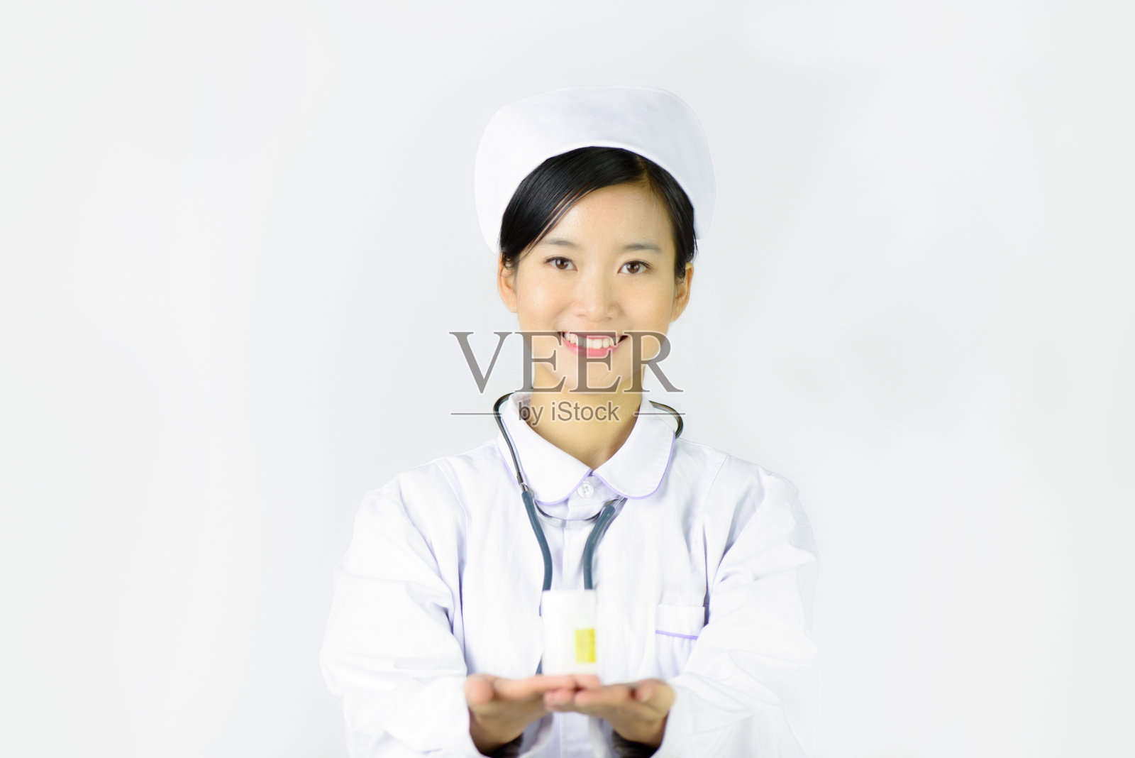 美丽的护士在一个白色孤立的背景照片摄影图片