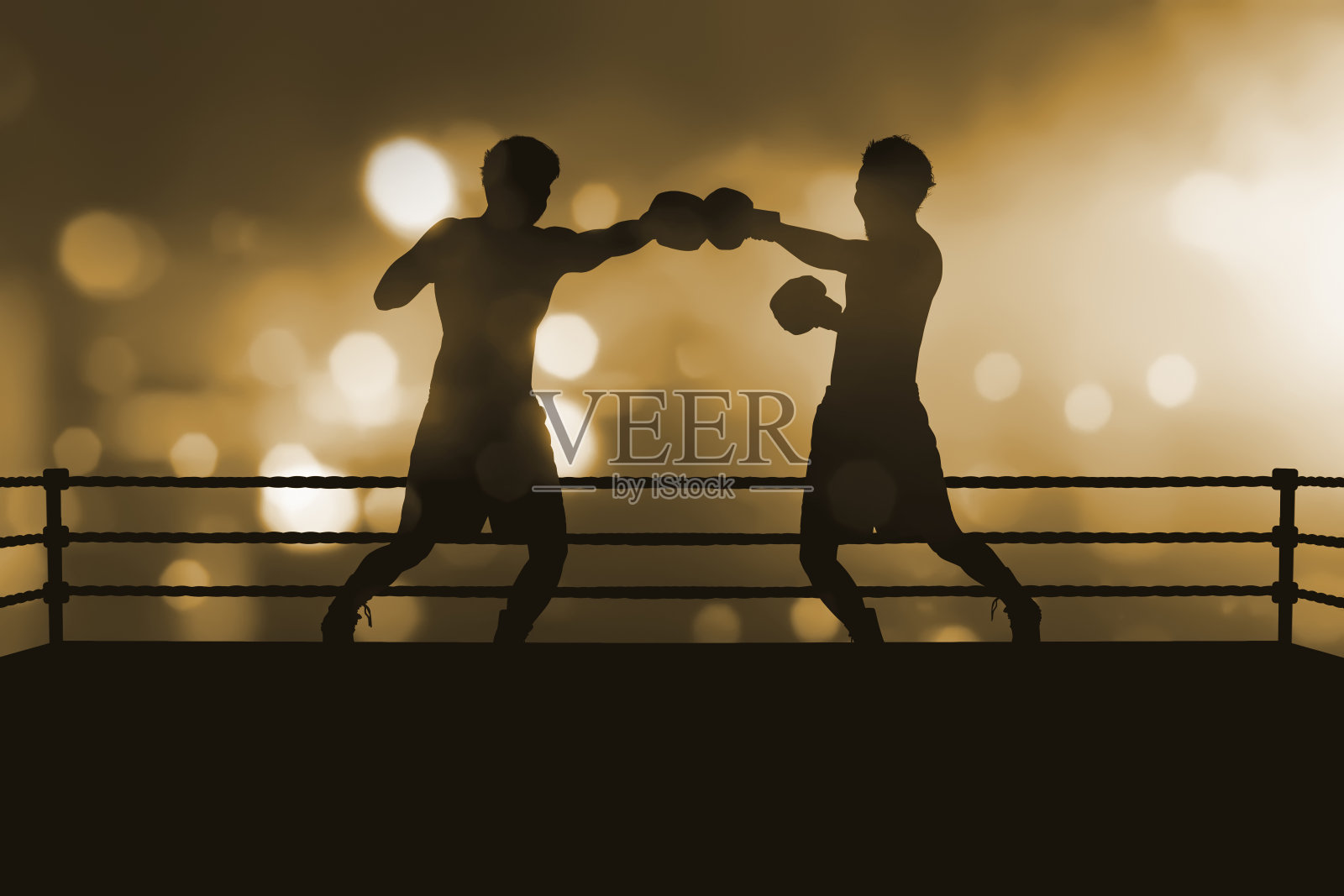 剪影的两个职业亚洲拳击手在拳击比赛照片摄影图片