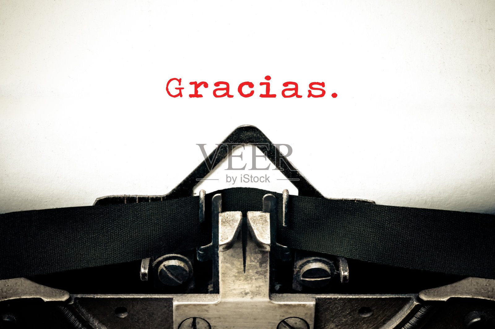 用西班牙语写“gracias”的打字机照片摄影图片