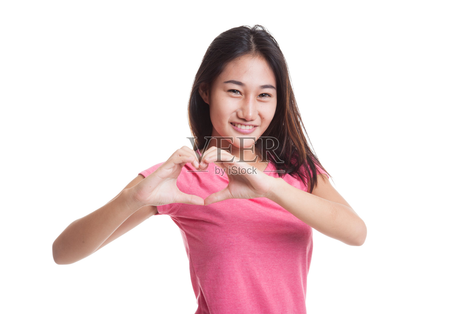 年轻的亚洲女子展示心手手势。照片摄影图片