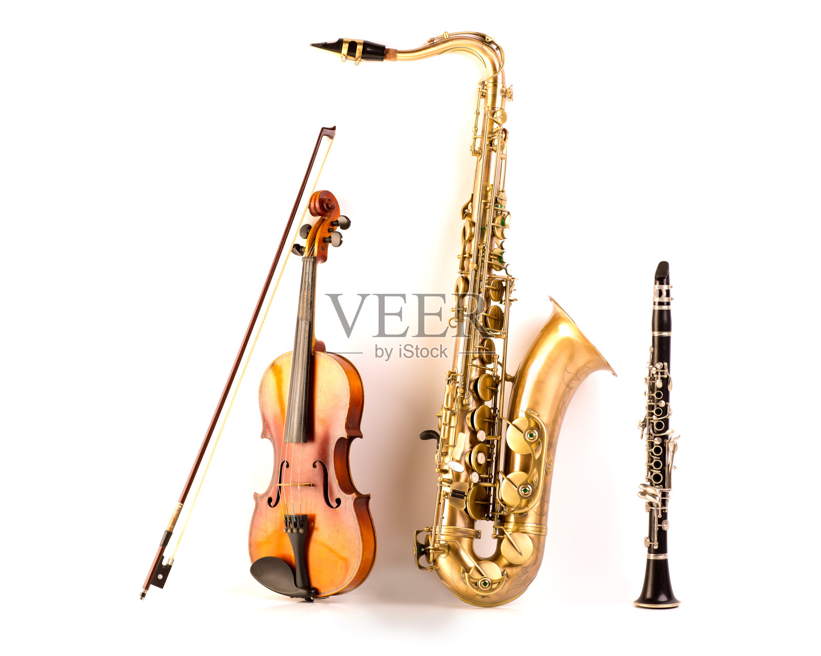 高音萨克斯、小提琴萨克斯管和单簧管都是白色的照片摄影图片
