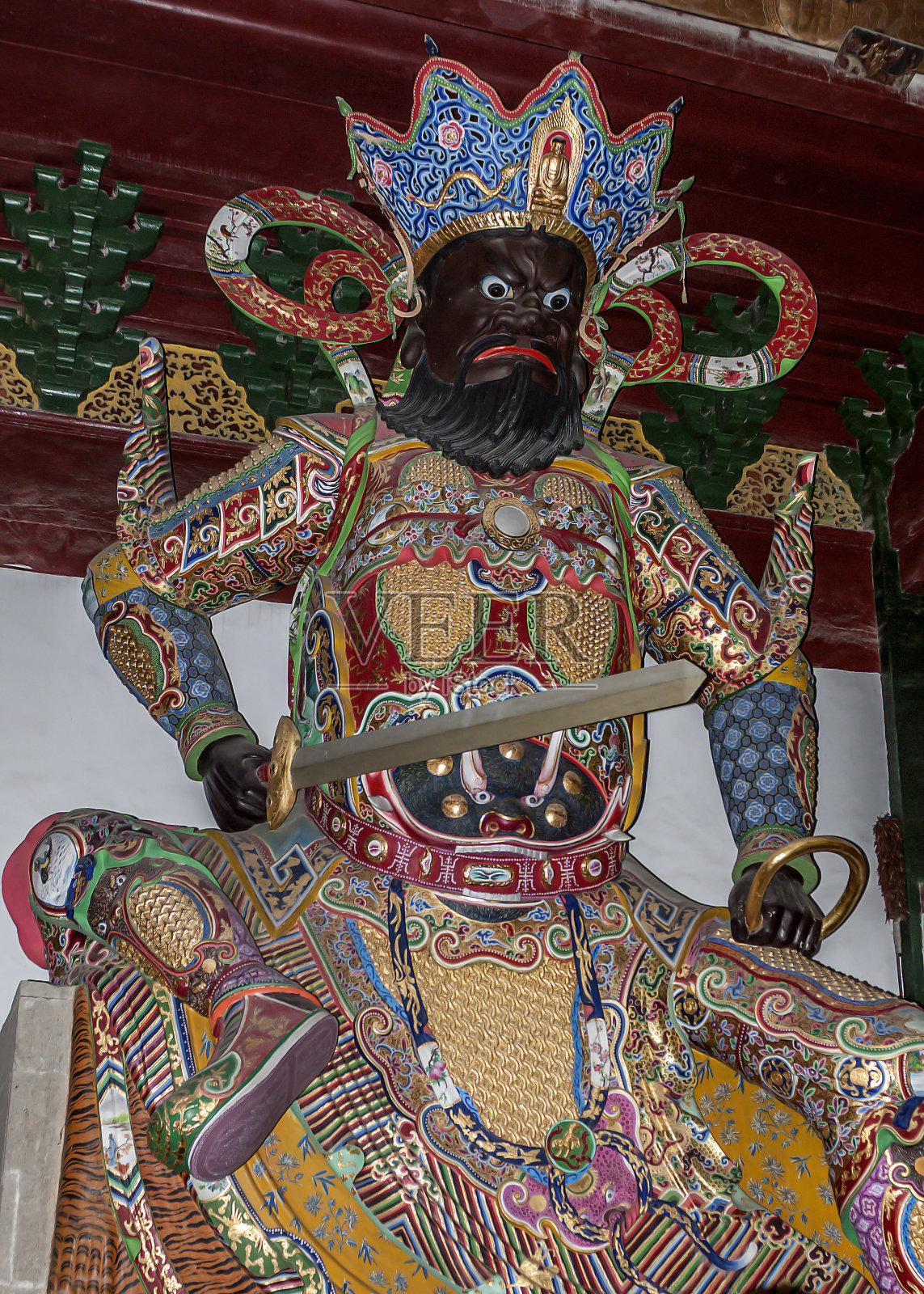 雕像Virudhaka与剑，生育和生长的守护神。照片摄影图片