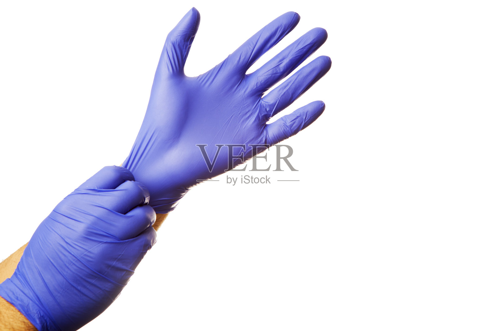 医生戴上防护蓝手套隔离在白色照片摄影图片