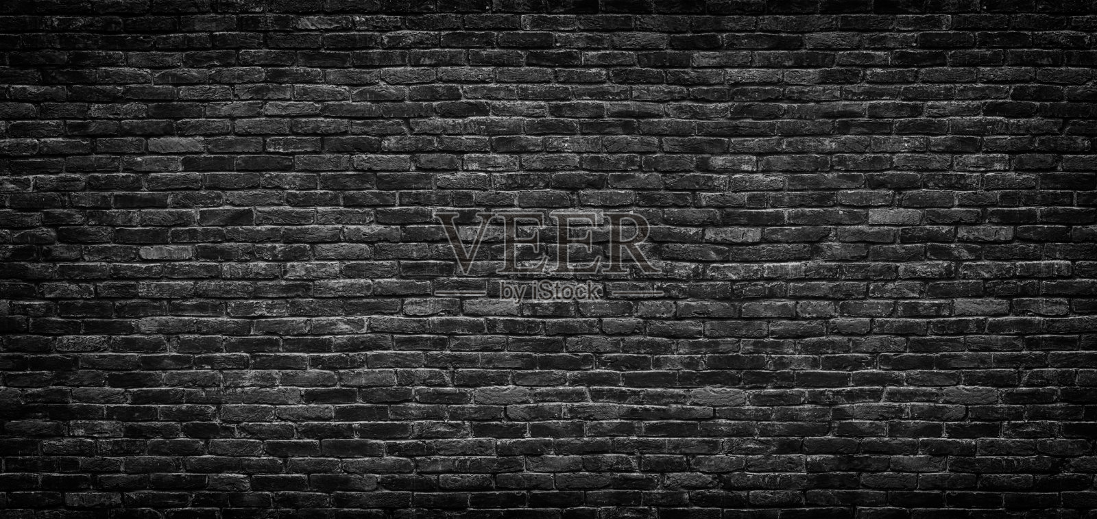 砖墙纹理为黑色，砖面为背景照片摄影图片