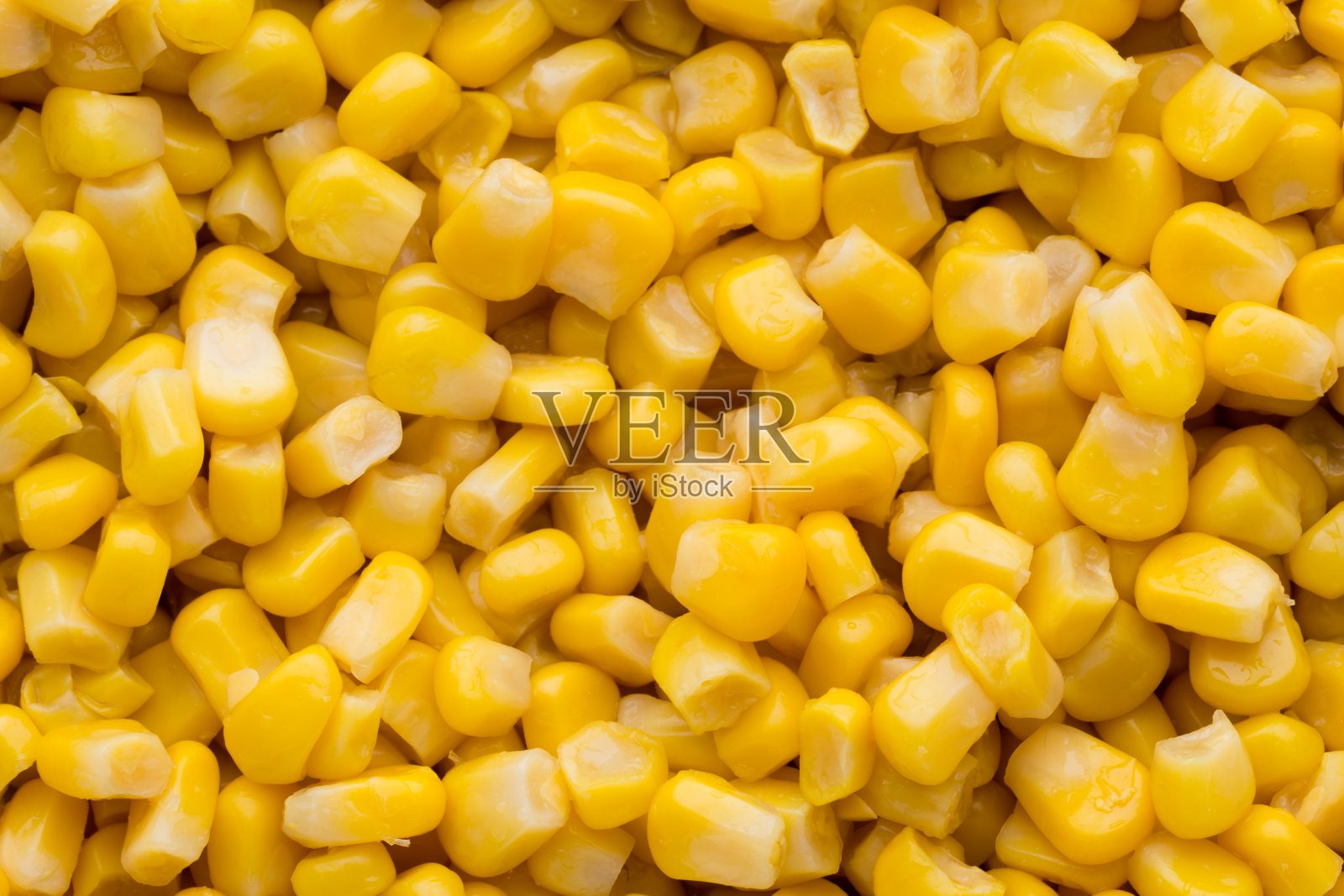 大量黄色玉米粒质地。照片摄影图片