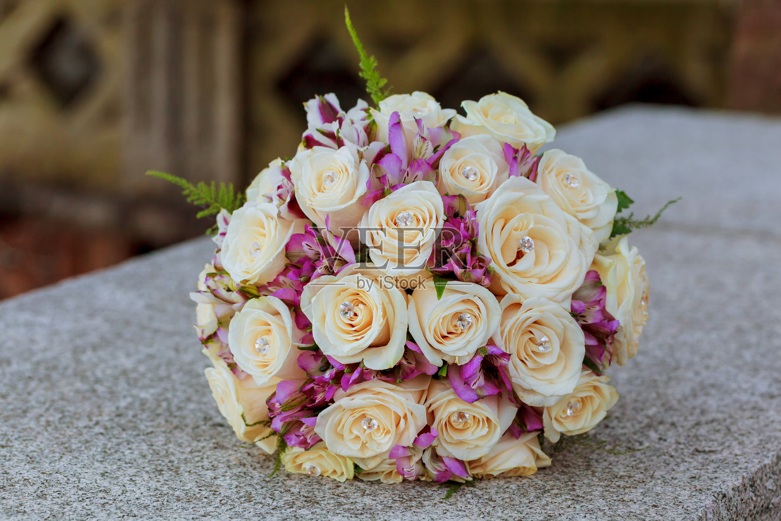 粉红色和玫瑰的婚礼花束照片摄影图片
