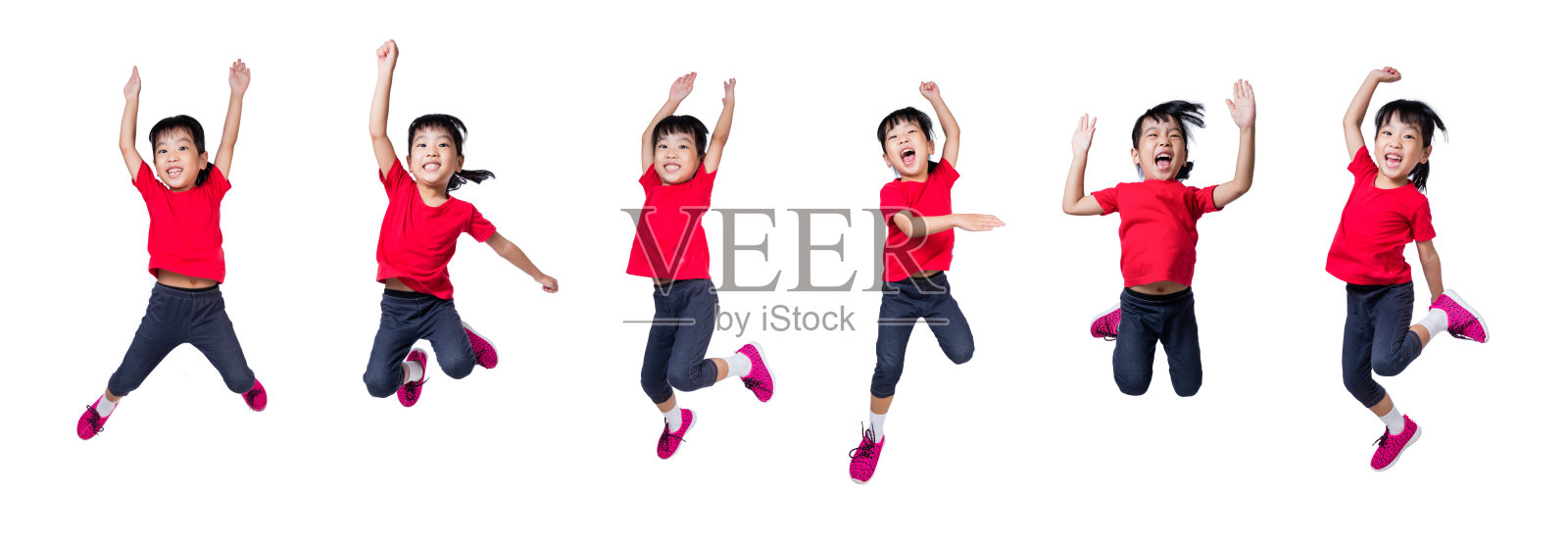 亚洲华人小女孩跳起来，挥舞着她的手照片摄影图片
