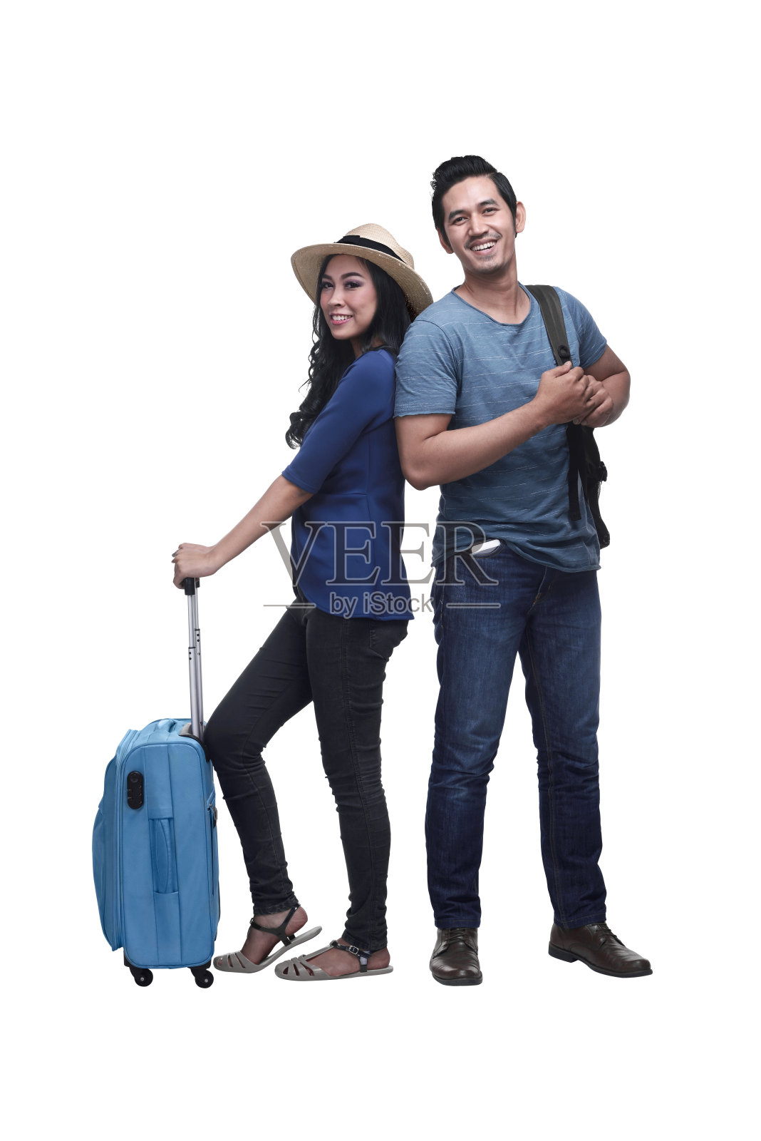 旅行者亚洲夫妇与背包和手提箱站立照片摄影图片