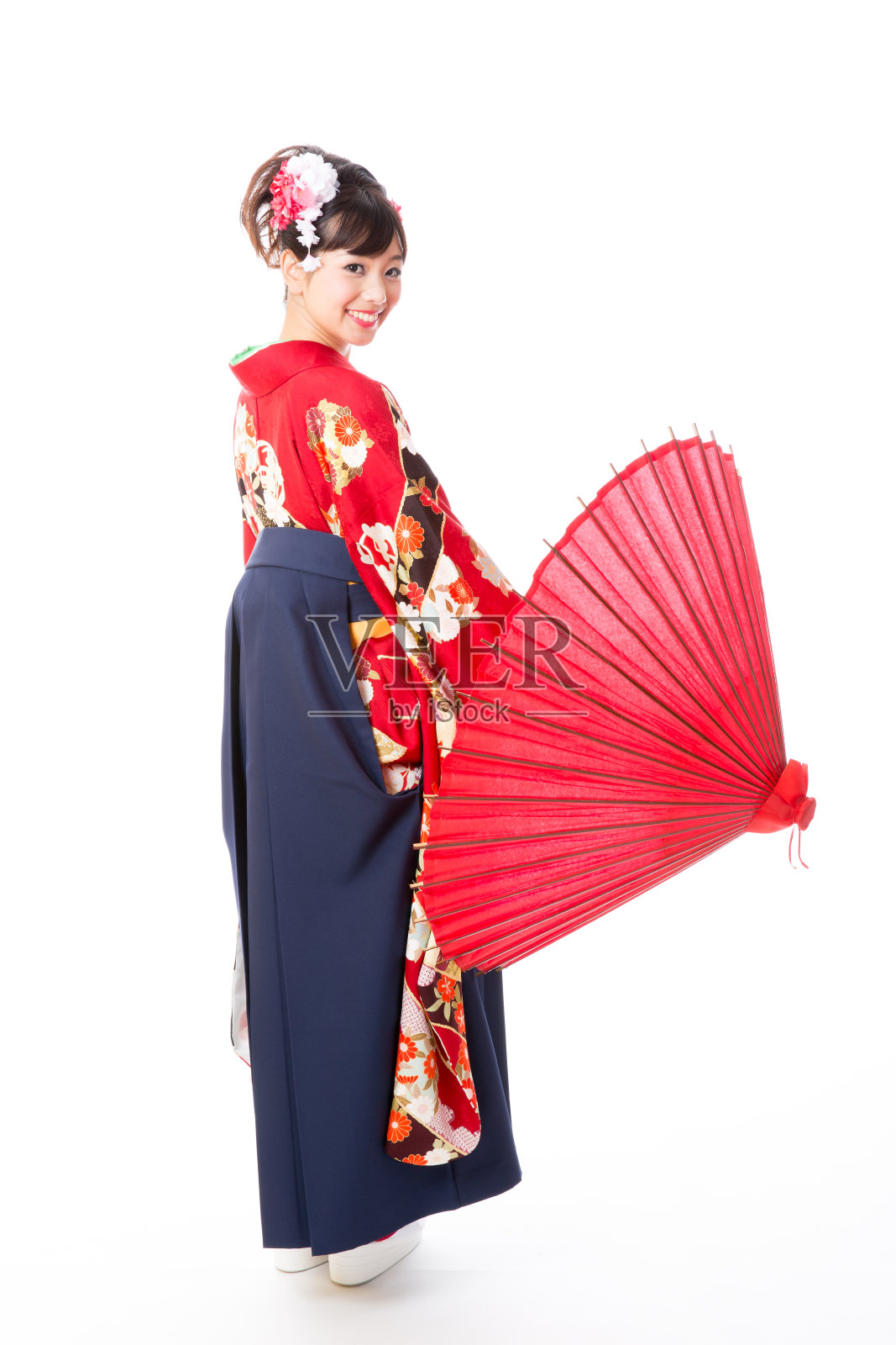 迷人的亚洲女人穿着袴孤立在白色背景照片摄影图片