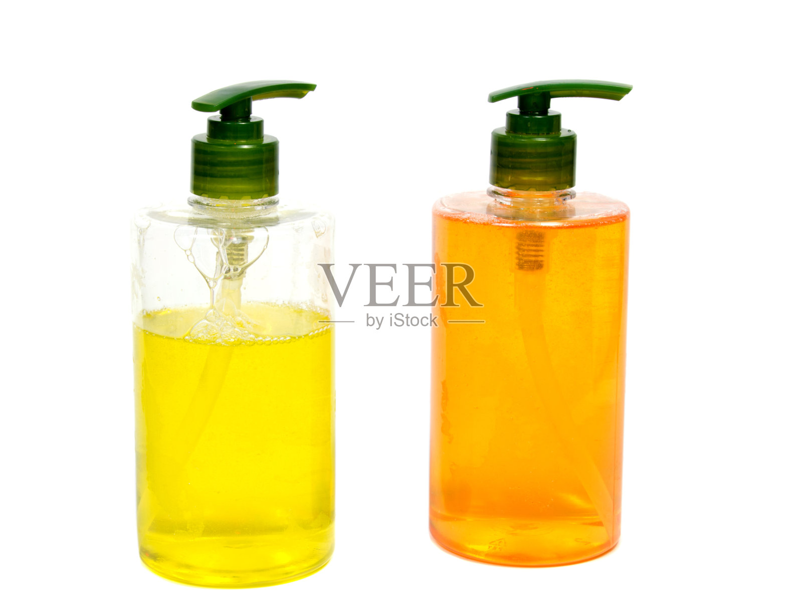 液体肥皂瓶黄色液体在瓶中孤立在白色背景。照片摄影图片