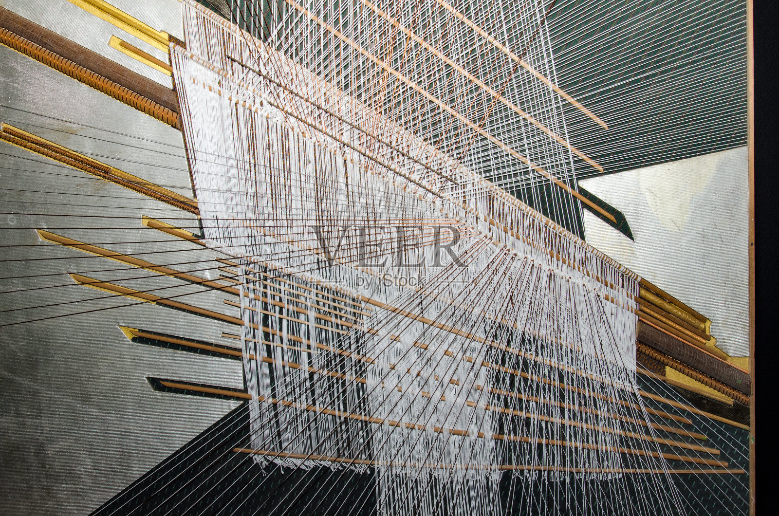传统的泰国丝绸手工编织工艺照片摄影图片
