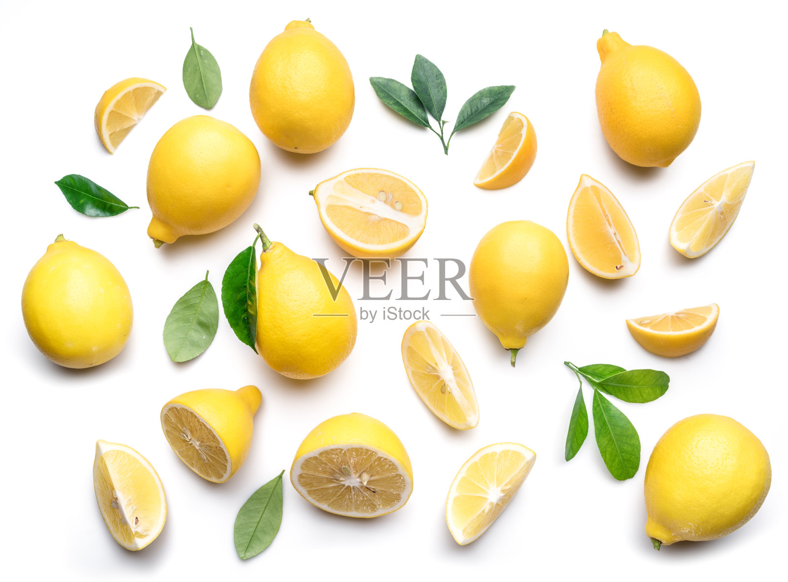 成熟的柠檬和柠檬叶。照片摄影图片