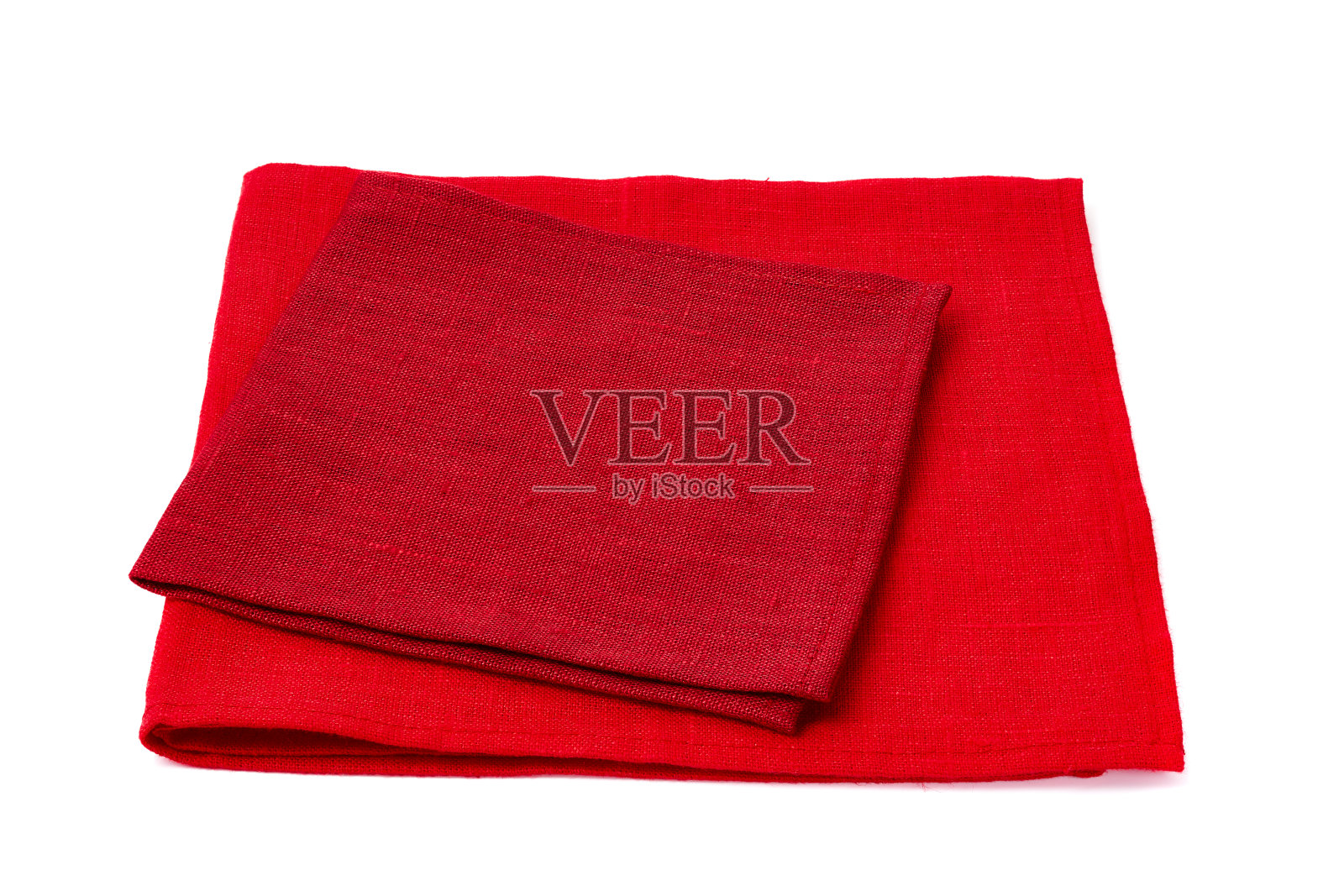 两张红色的餐巾放在白色的上面照片摄影图片