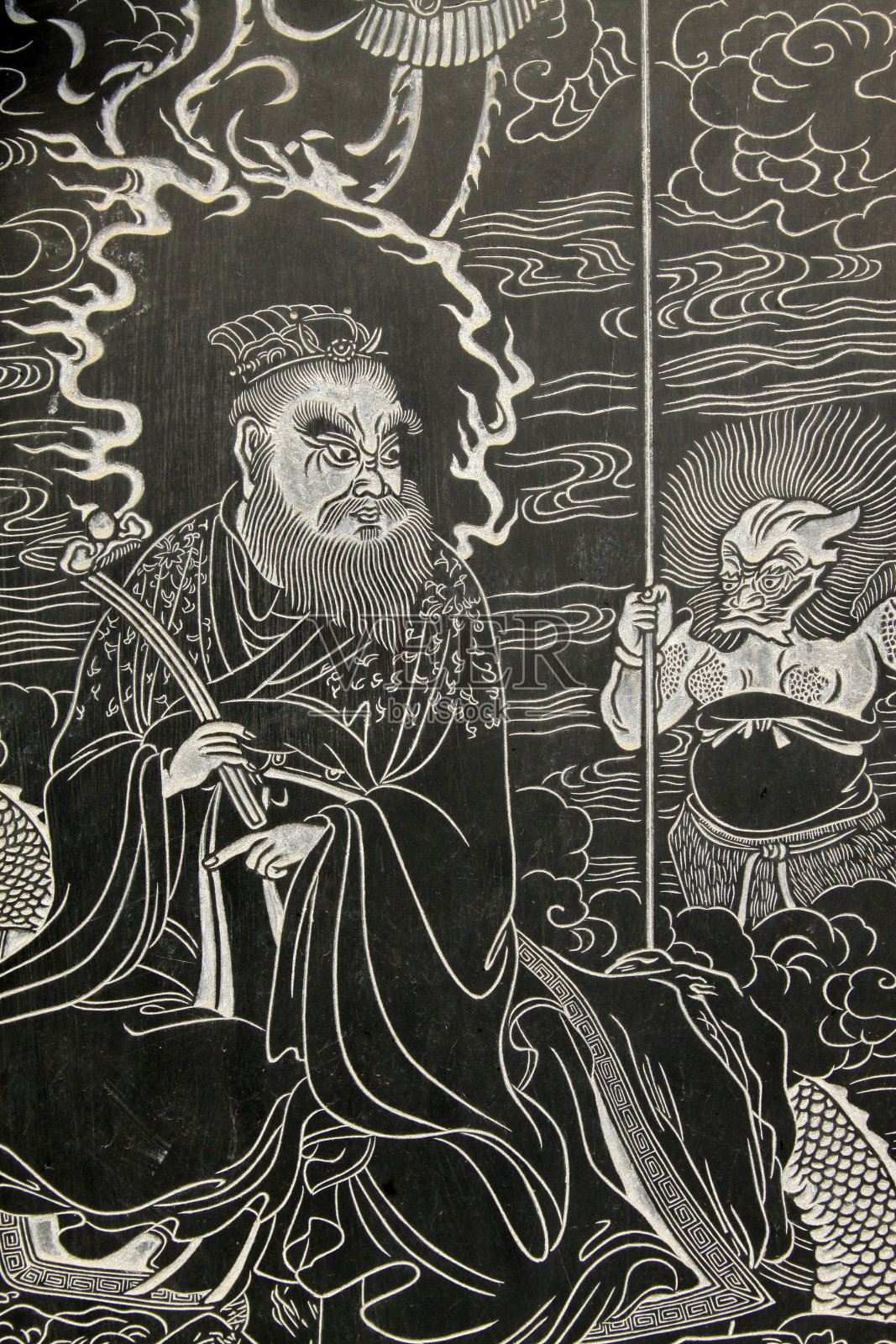 2014年5月18日，中国河北省玉田县集觉寺黑色大理石上雕刻的精美雕像插画图片素材