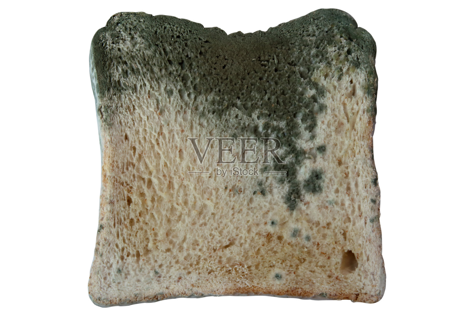 发霉的面包孤立在白色的背景下，不能食用的食物和过期。照片摄影图片