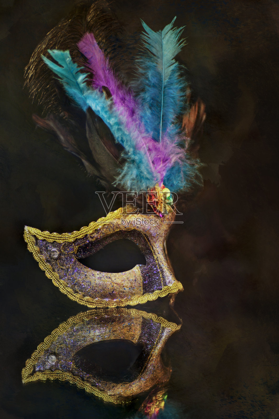 威尼斯狂欢节面具，女性戏剧羽毛照片摄影图片