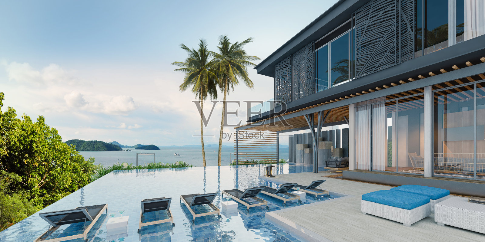 海景游泳池在现代阁楼设计，豪华的海洋海滩房子照片摄影图片