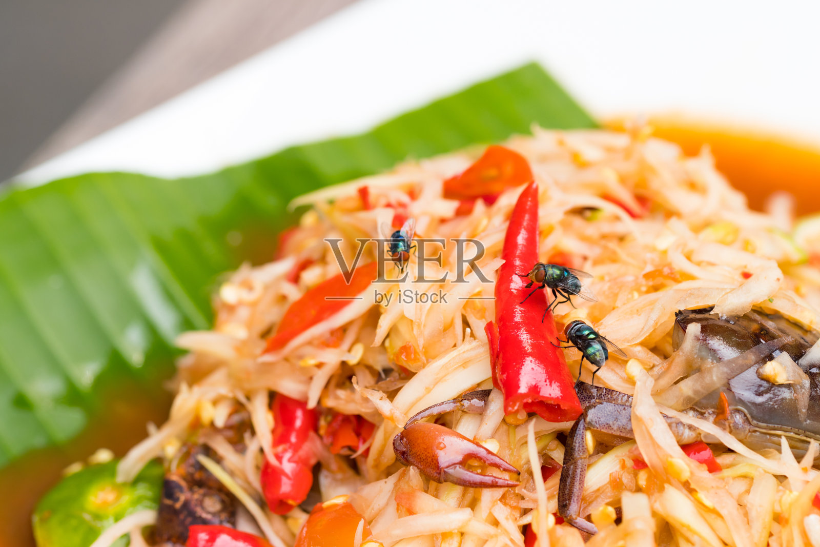 Som Tum泰国。泰式木瓜沙拉辛辣食物，传统的泰国食物照片摄影图片
