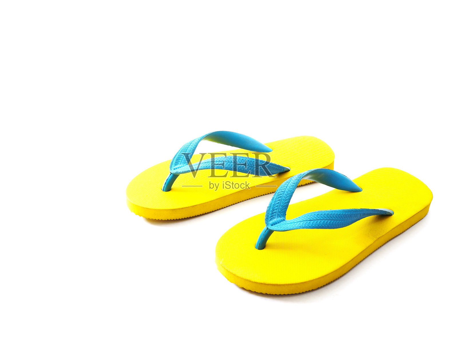 黄色和蓝色的橡胶拖鞋照片摄影图片