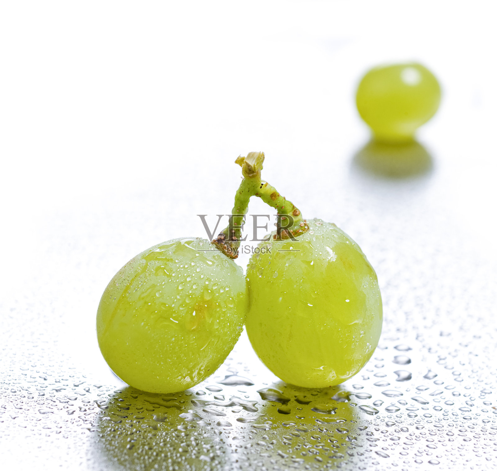 双绿葡萄。照片摄影图片