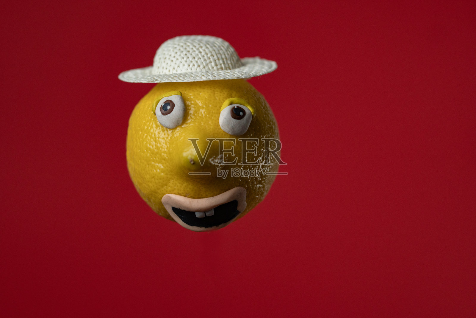 柠檬和帽子照片摄影图片