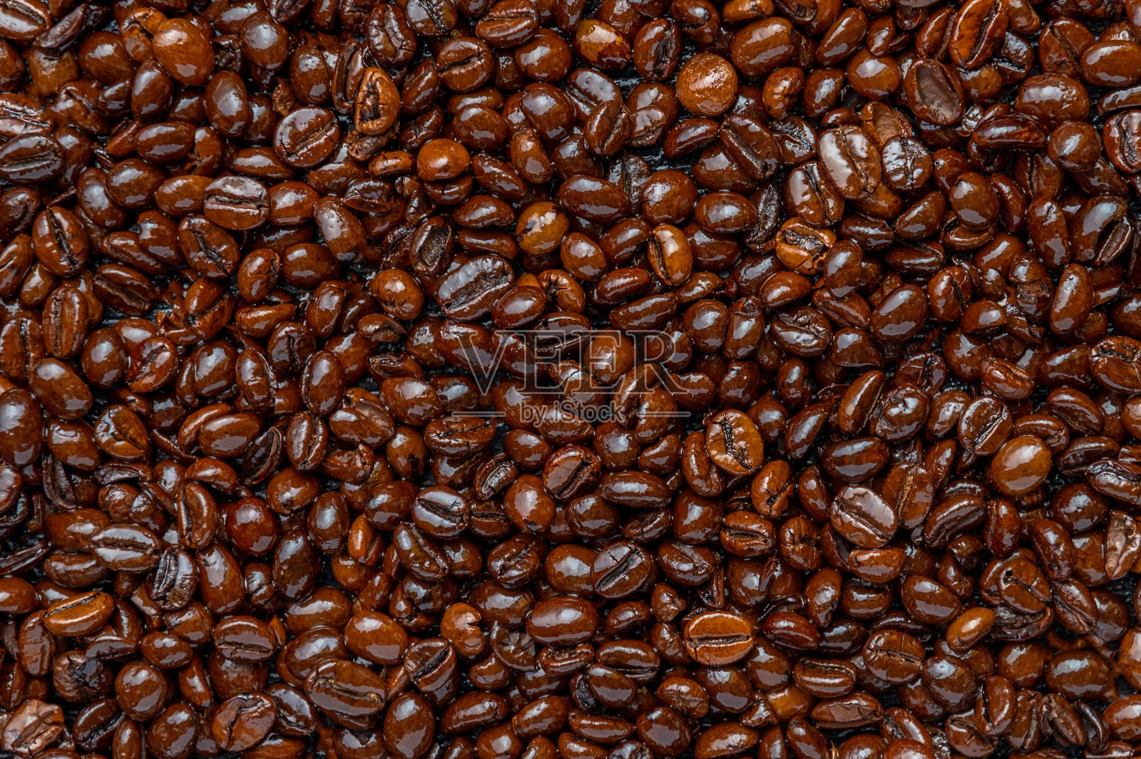 烘焙咖啡豆特写背景。照片摄影图片