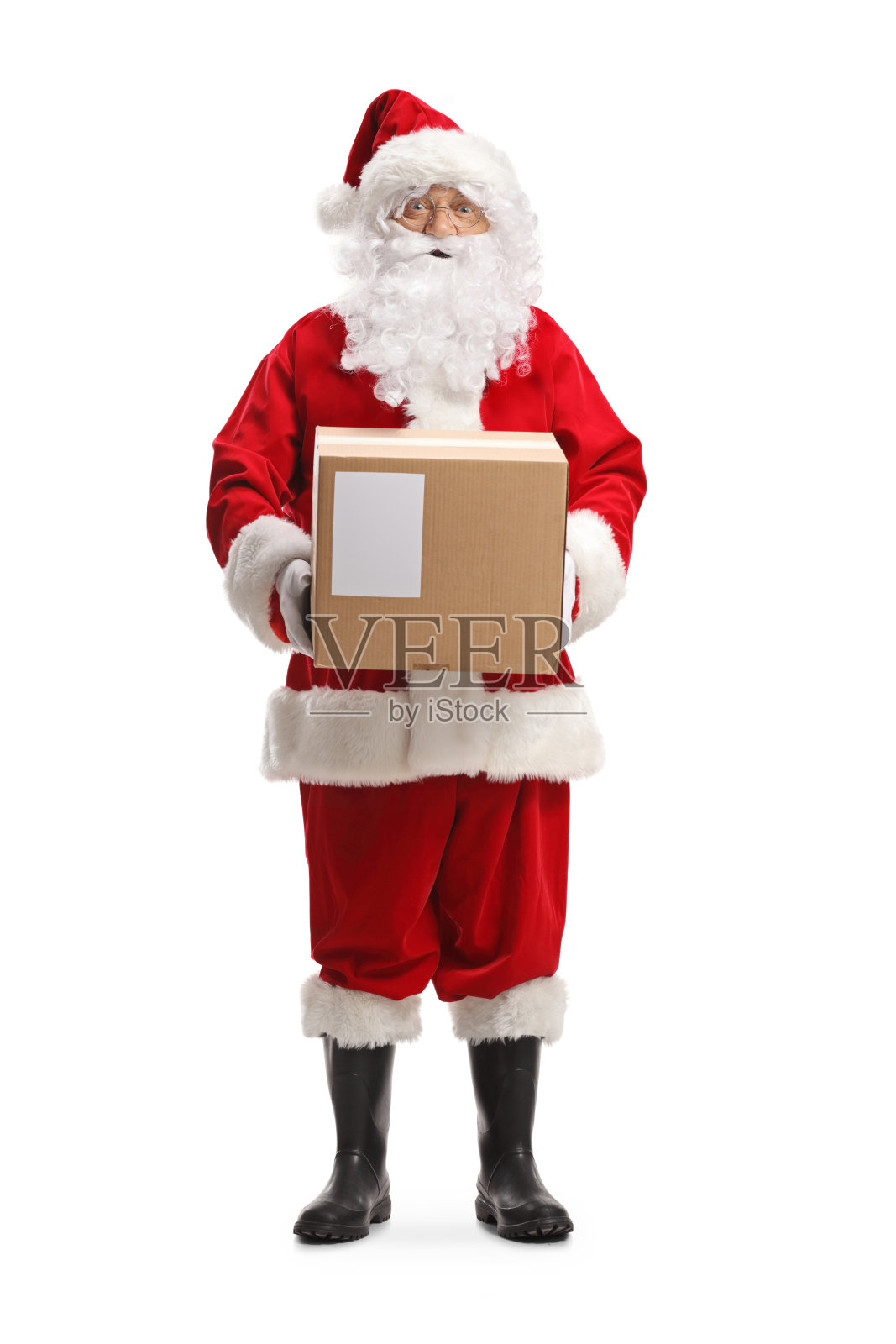 一个带着纸箱的圣诞老人的全身像照片摄影图片