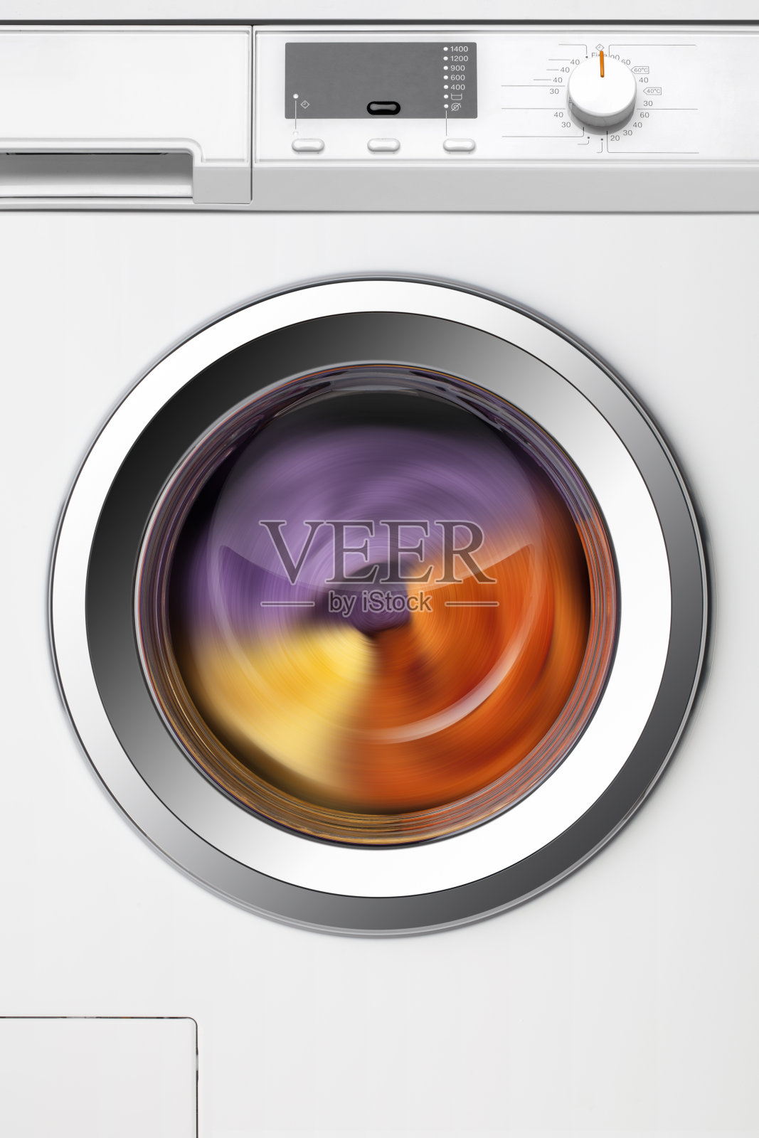 内装可旋转衣物的洗衣机照片摄影图片