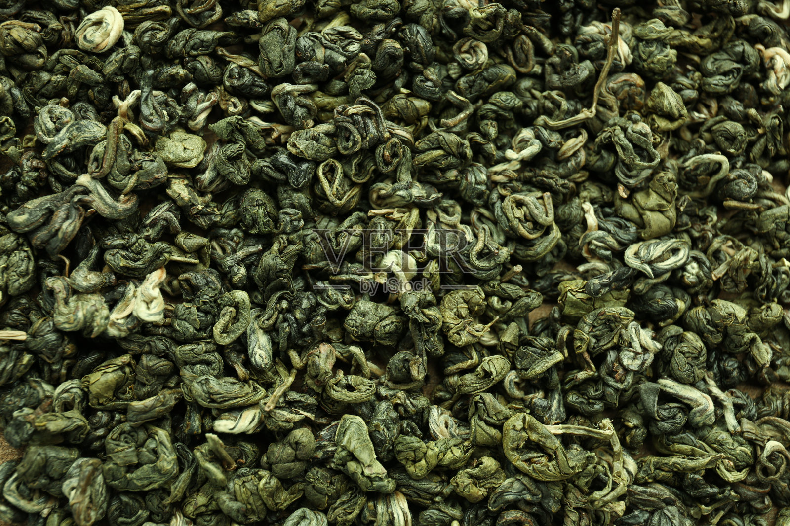 干绿茶叶为背景，俯视图照片摄影图片
