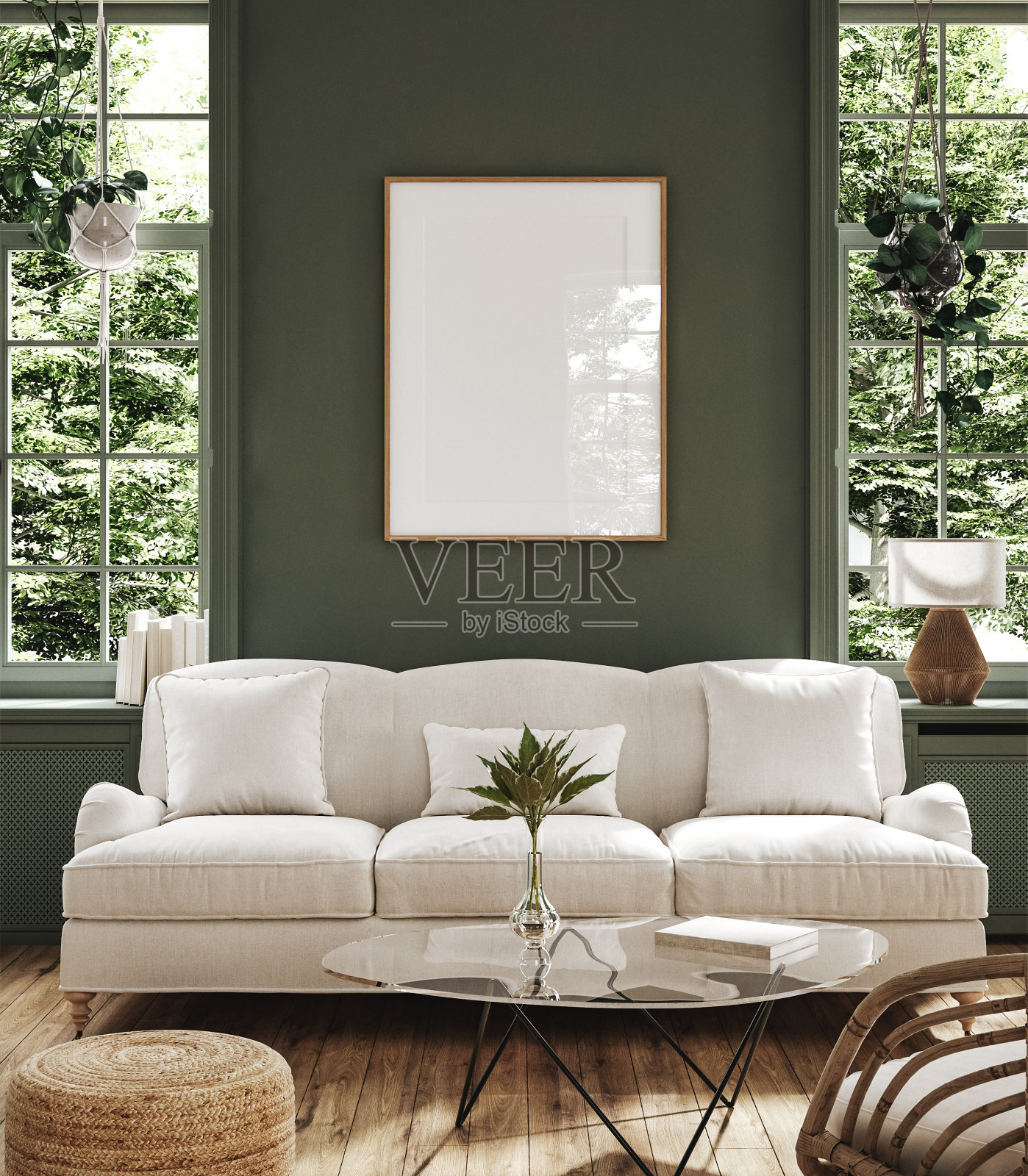 海报框架模型在家庭内部背景与沙发，桌子和装饰在客厅照片摄影图片