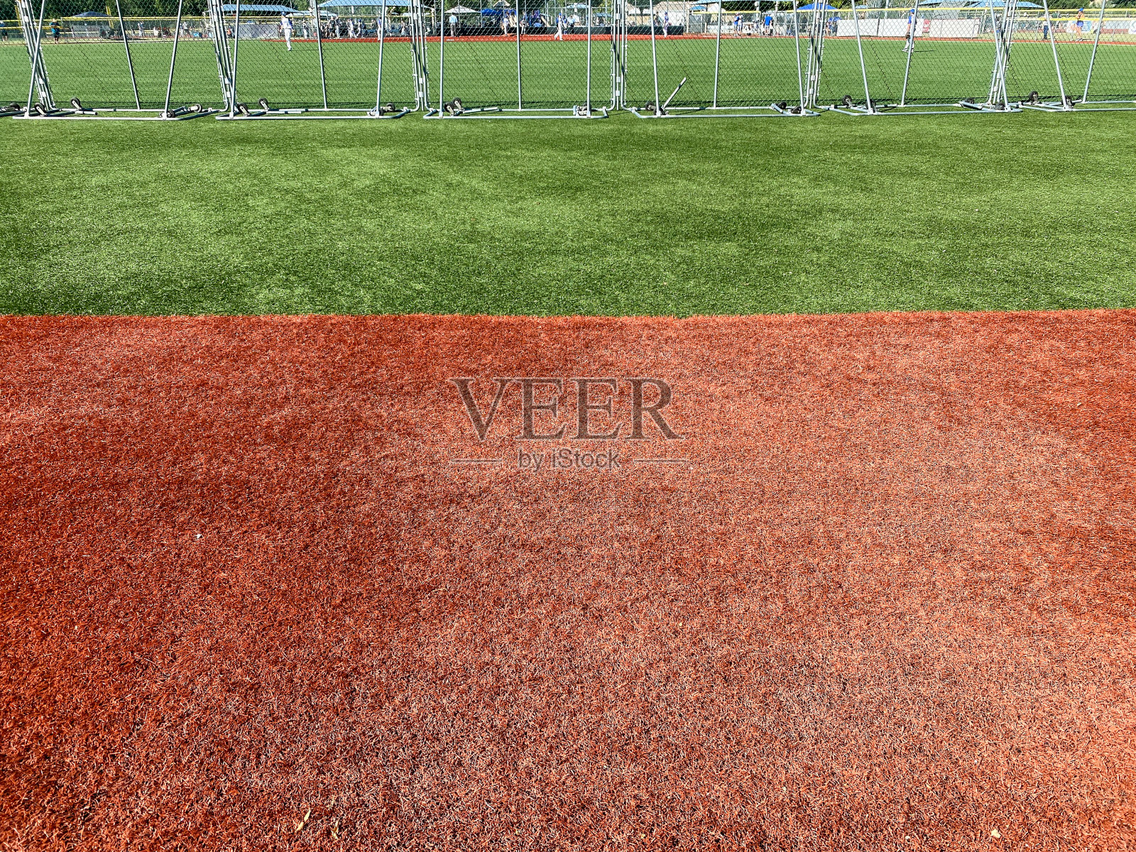 足球运动棒球场，人造草皮在绿色和红色照片摄影图片