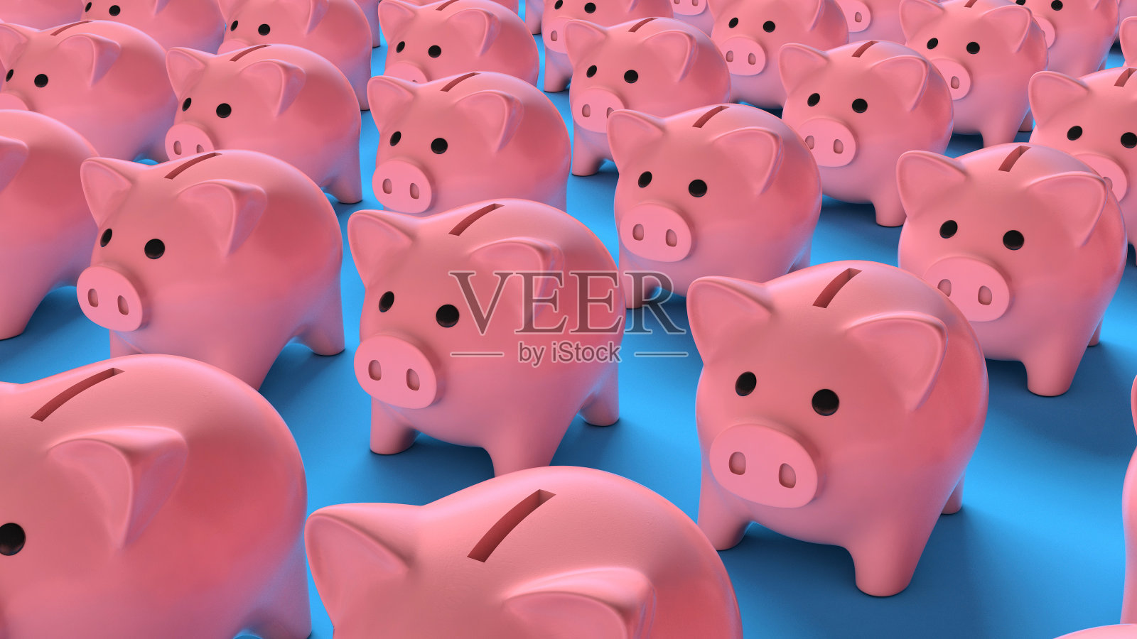 一群粉红色的存钱罐在蓝色的上面照片摄影图片