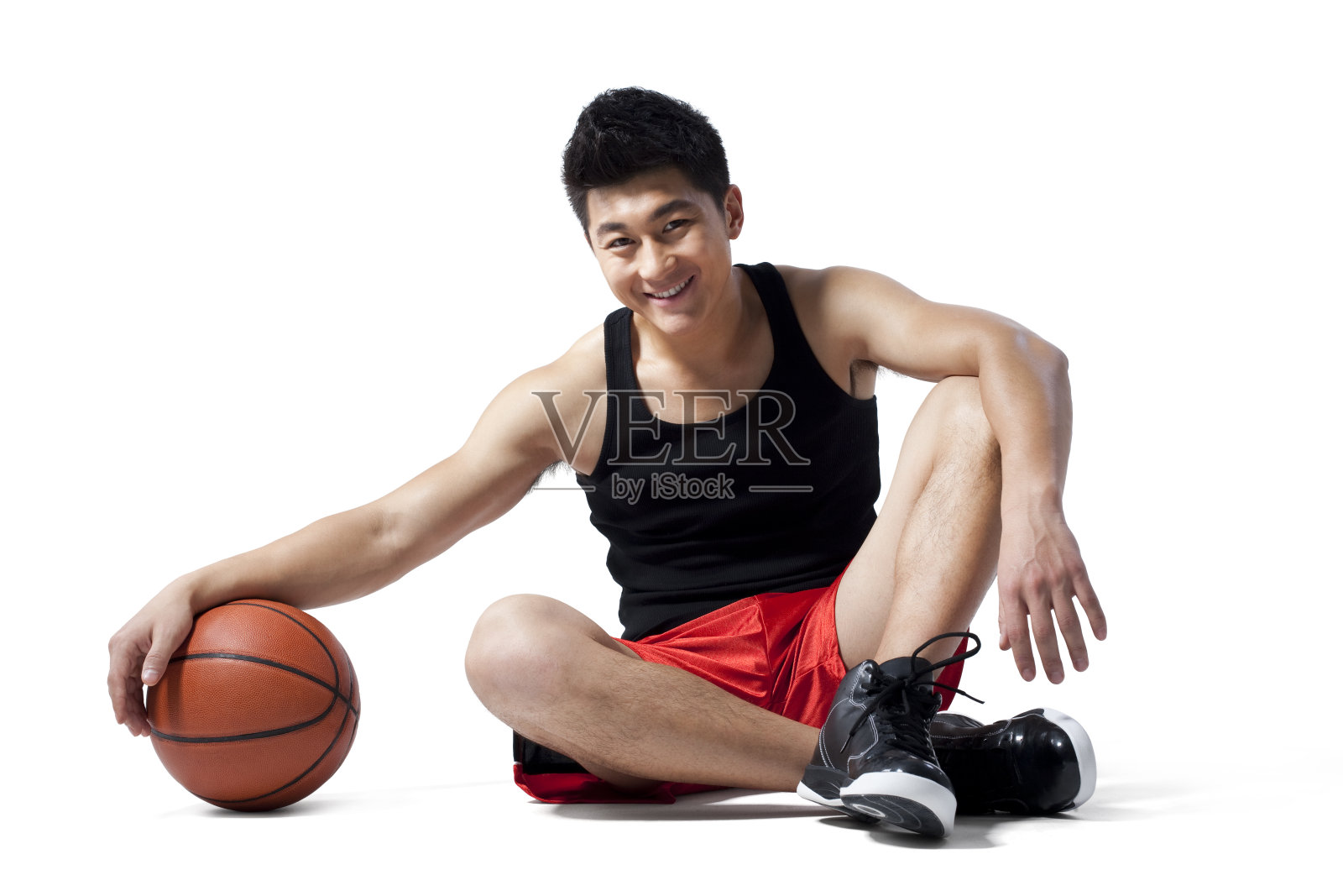 青年男子和篮球照片摄影图片