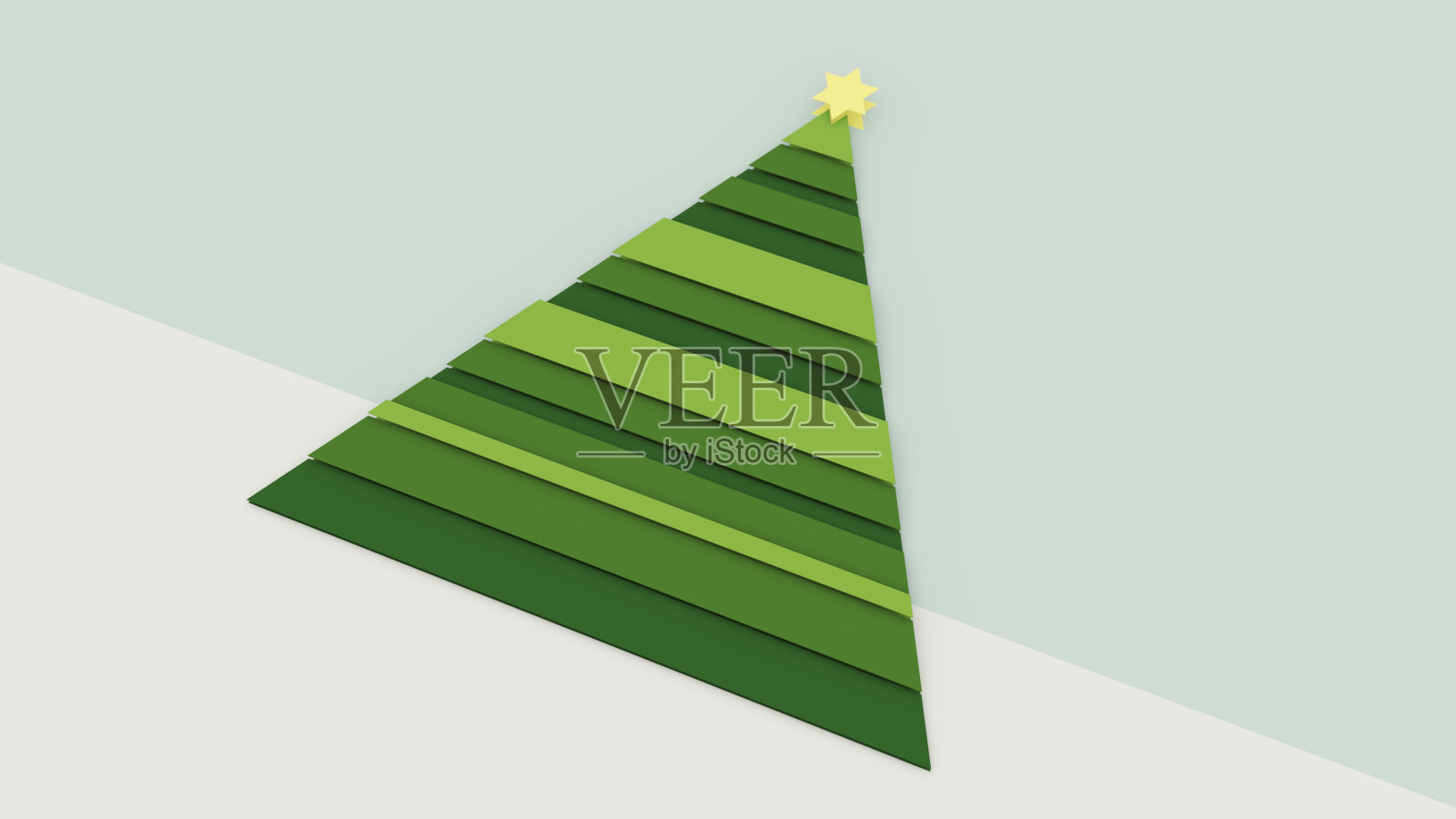 抽象圣诞树与伯利恒之星符号制成的绿色三角形与粉彩蓝色灰色的天空和冬季雪节日象征照片摄影图片
