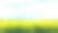 绿黄色的油菜花和蓝天白云在夏天的一天。水平背景，风景乡土农场概念。副本的空间。孤独平静心情沉思自然。素材图片
