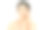 美丽的年轻亚洲女人裸露的肩膀是应用面霜在她的脸上和和看远处孤立的白色背景。女性美脸护肤理念。素材图片